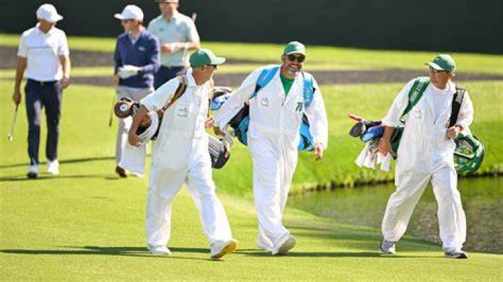 Why do Masters caddies wear white?