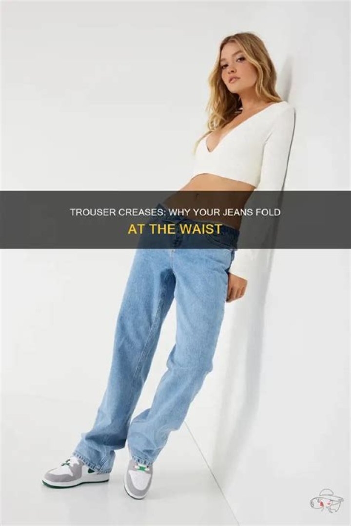 Why do my jeans fold at the waist?