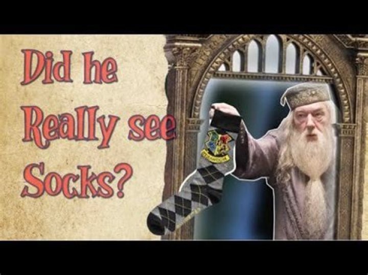 Why does Dumbledore see socks in the mirror?