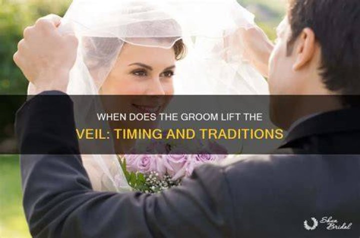 Why does the groom lift the veil?