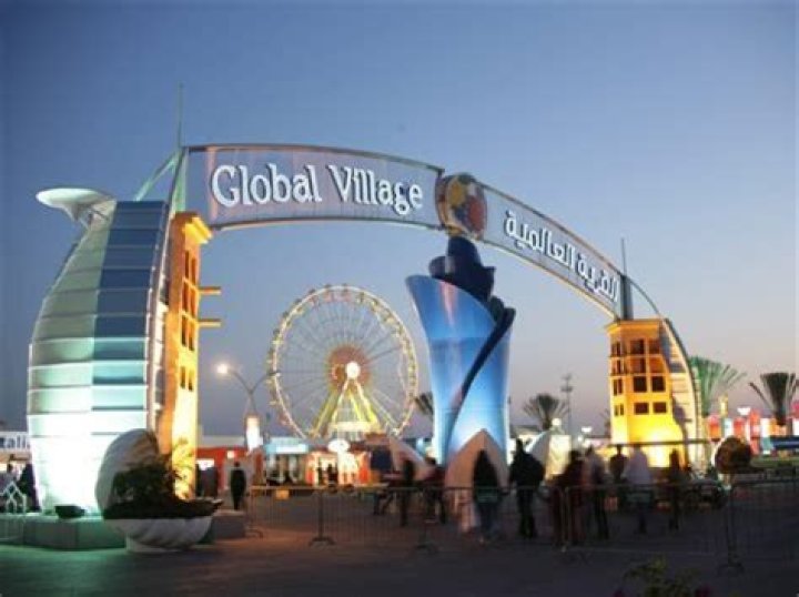 Why is the world called a global village in Business?
